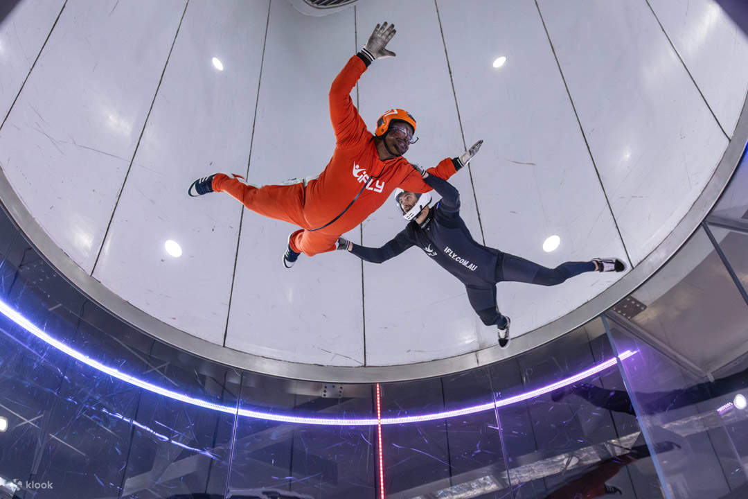Experience high-flying adventures in orange suits, defying gravity with expert guidance