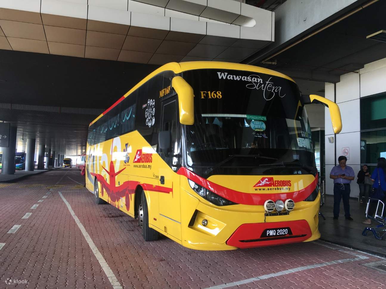 yellow bus in kuala lumpur airport